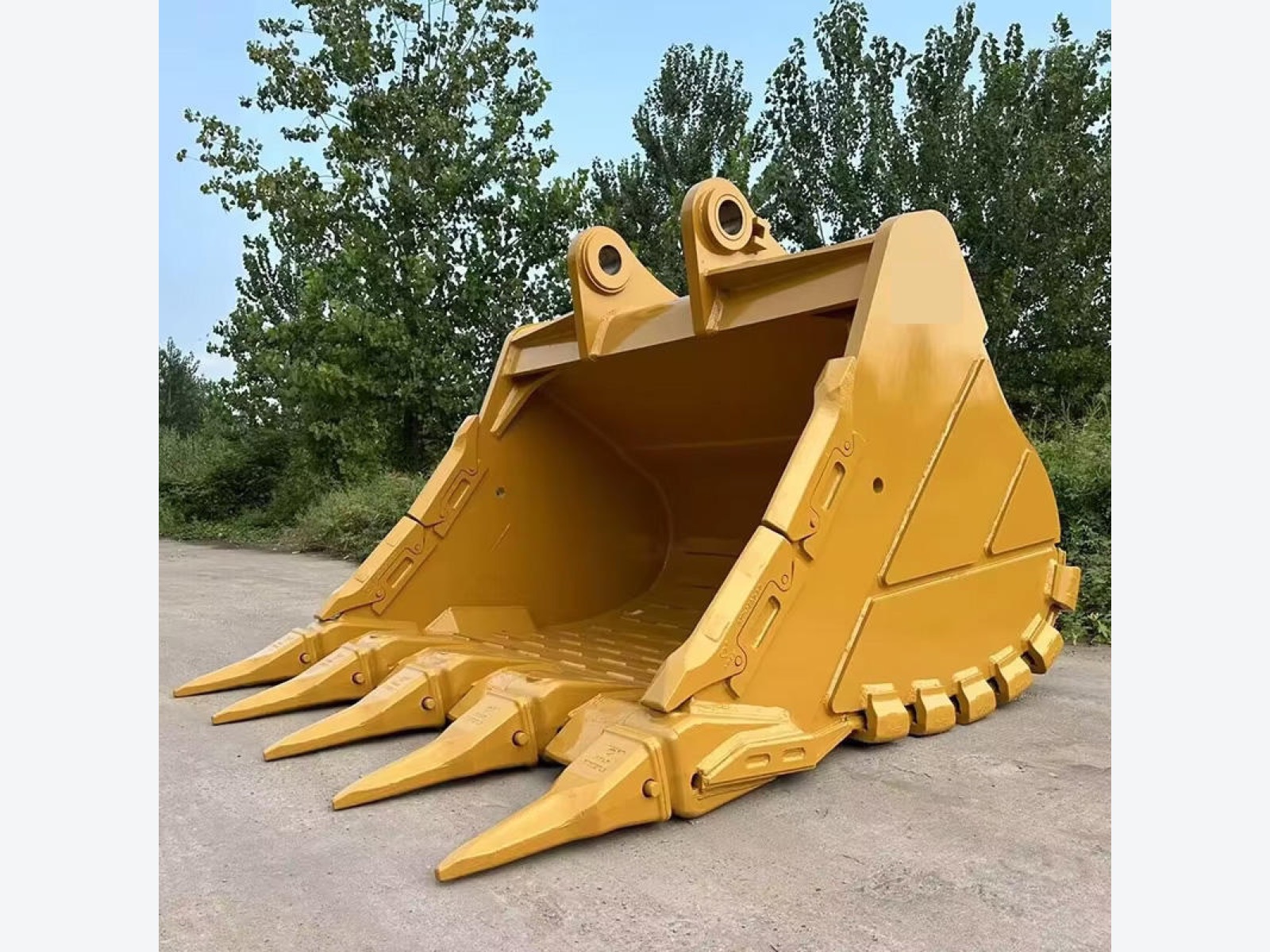 Excavator bucket attachment